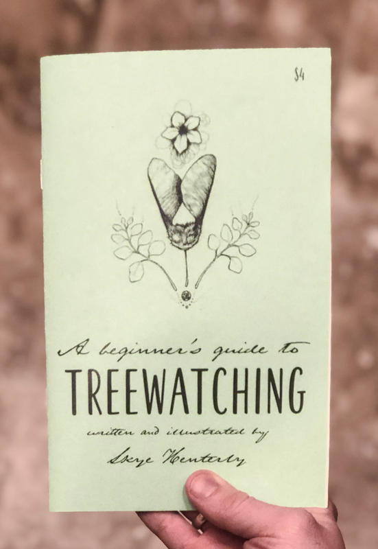 a zine cover with tree seeds and flowers.